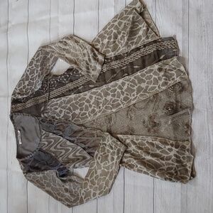 ADORE MULTIMEDIA ASYMMETRICAL TUNIC TOP